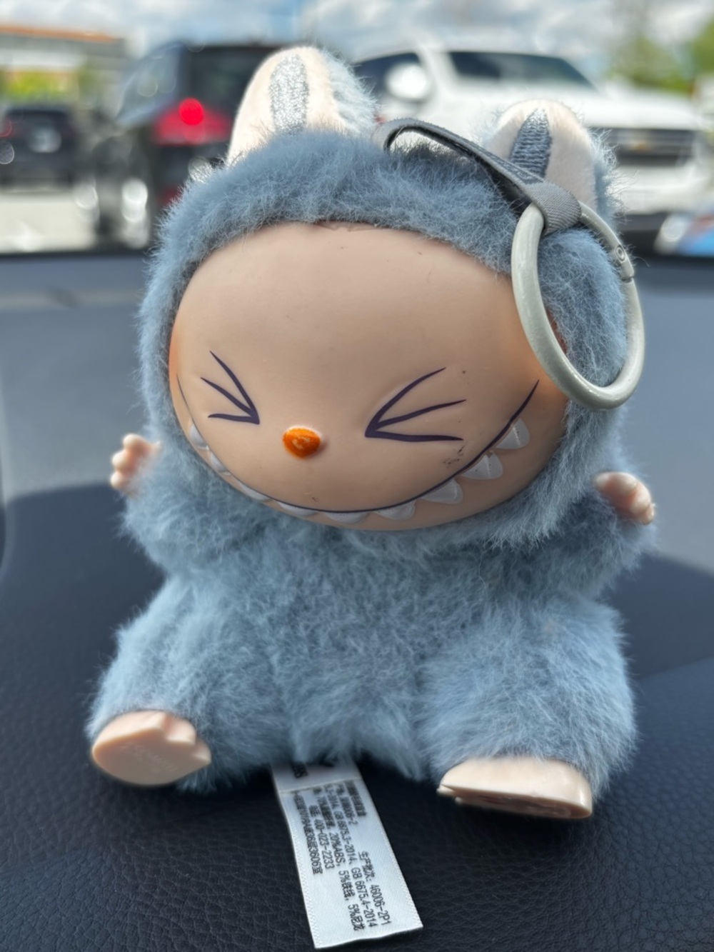 Fuzzy Blue Monster Plush Keychain by The Monsters
